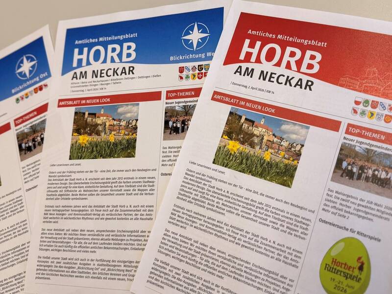 Das Bild zeigt drei Ausgaben des "Amtsblatts Horb am Neckar" mit unterschiedlichen Titelfarben und Schlagzeilen.